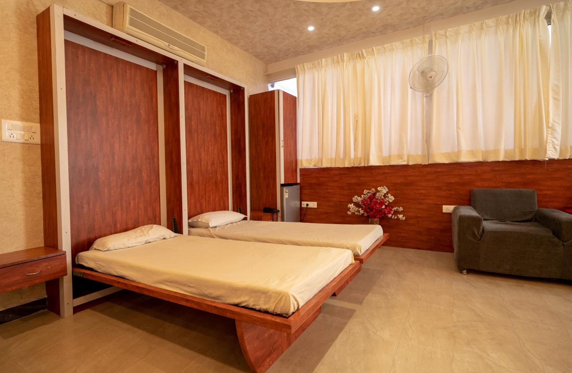 Seasons Suites Koramangala Бангалор Стая снимка