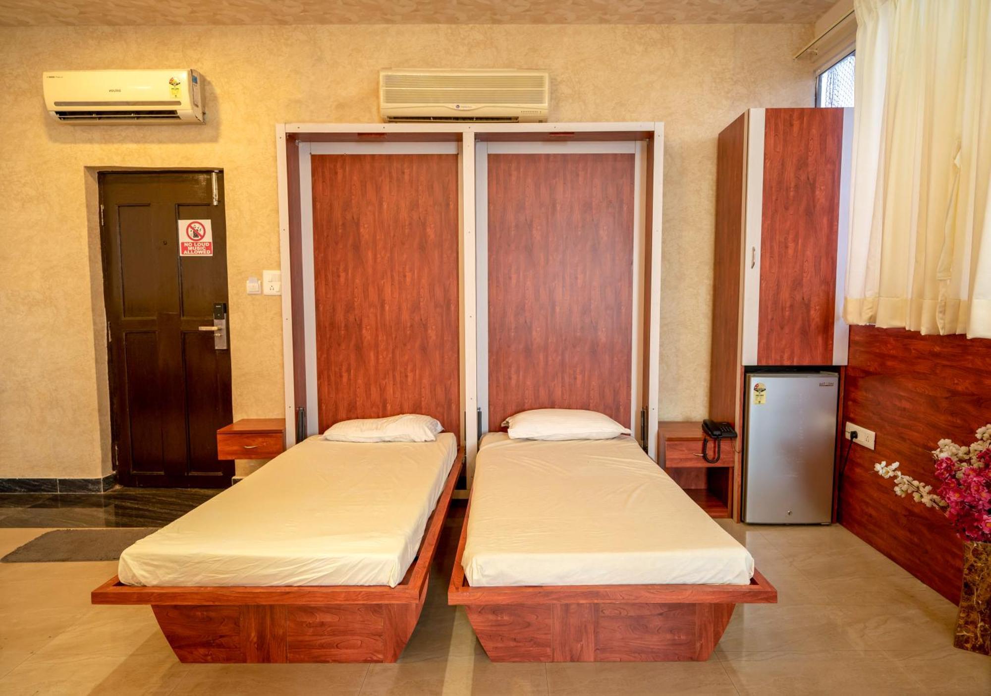 Seasons Suites Koramangala Бангалор Стая снимка